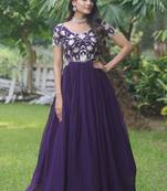 Purple colour partywear gown for girlish looks