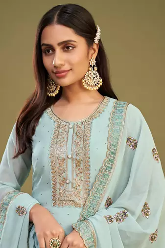 Firozi colour partywear georgette fabric salwar kameez with resham work