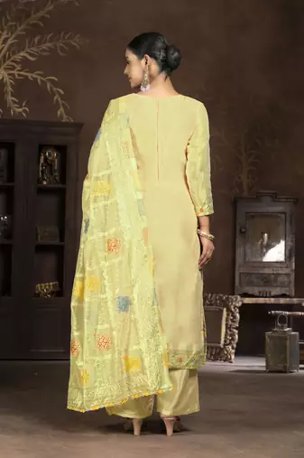 Yellow colour woven salwar kameez for ethnic fancy looks