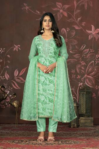 Green colour woven designer salwar kameez for ethnic fancy looks