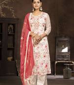 Cream coour ethnic salwar suit in modal butti fabric for looks