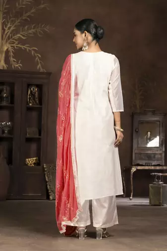 Cream coour ethnic salwar suit in modal butti fabric for looks