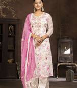 Cream coour ethnic salwar suit in modal butti embroidered for looks