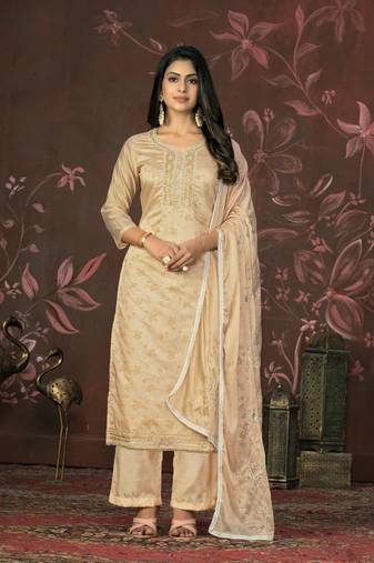 Peach colour ethnic dress material for festive indian looks