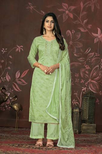 Green colour ethnic dress material for festive indian looks