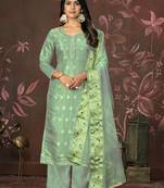 Elegant and girlish green colour modal butti suit for festive looks