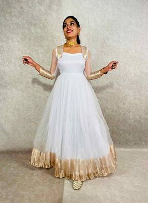 Attractive white organza  pattu with dyeing work  gown for women 1