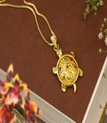Gold capped tortoise pendant necklace