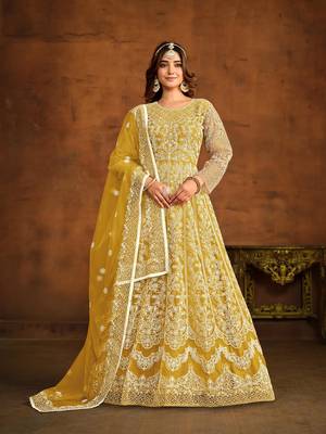 Yellow net heavy thread embroidery work salwar kameez 1