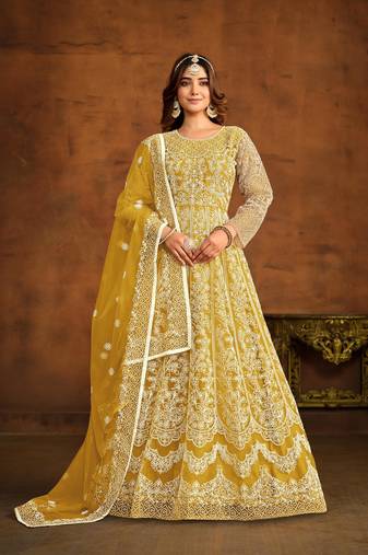 Yellow net heavy thread embroidery work salwar kameez