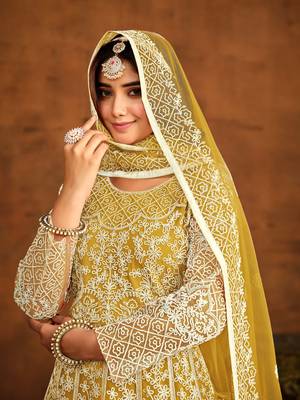 Yellow net heavy thread embroidery work salwar kameez 4