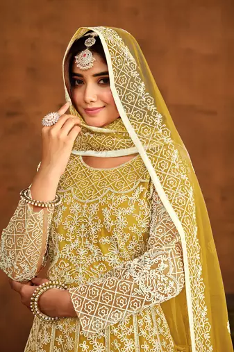 Yellow net heavy thread embroidery work salwar kameez
