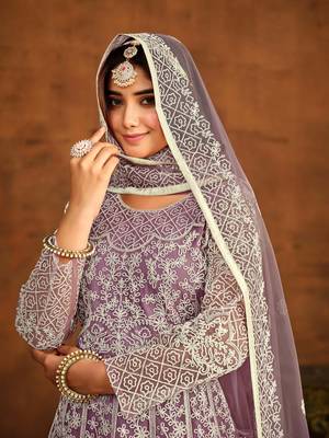 Light purple net heavy thread embroidery work salwar kameez 4