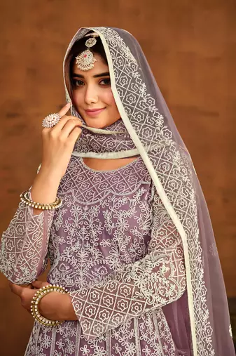 Light purple net heavy thread embroidery work salwar kameez