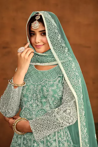 Sea green net heavy thread embroidery work salwar kameez