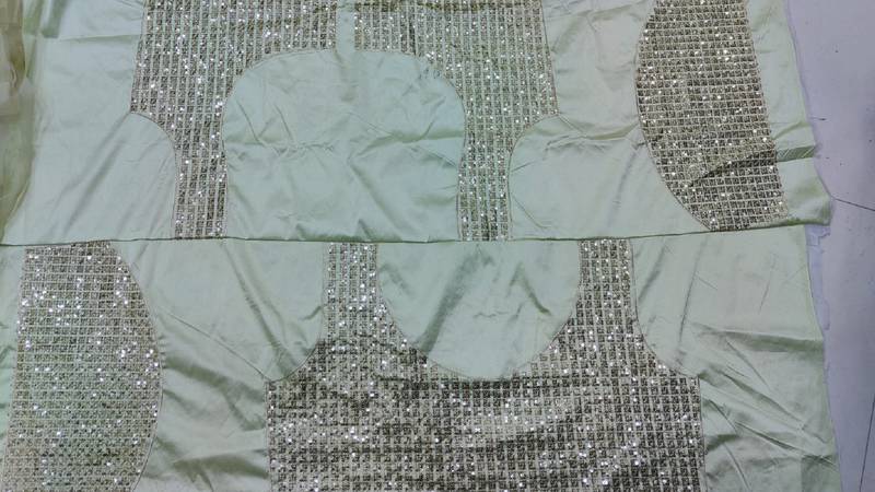 Aqua Green Sequins Embroidered Net Lehenga Choli