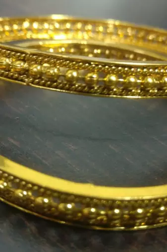 Gold bangles-and-bracelets
