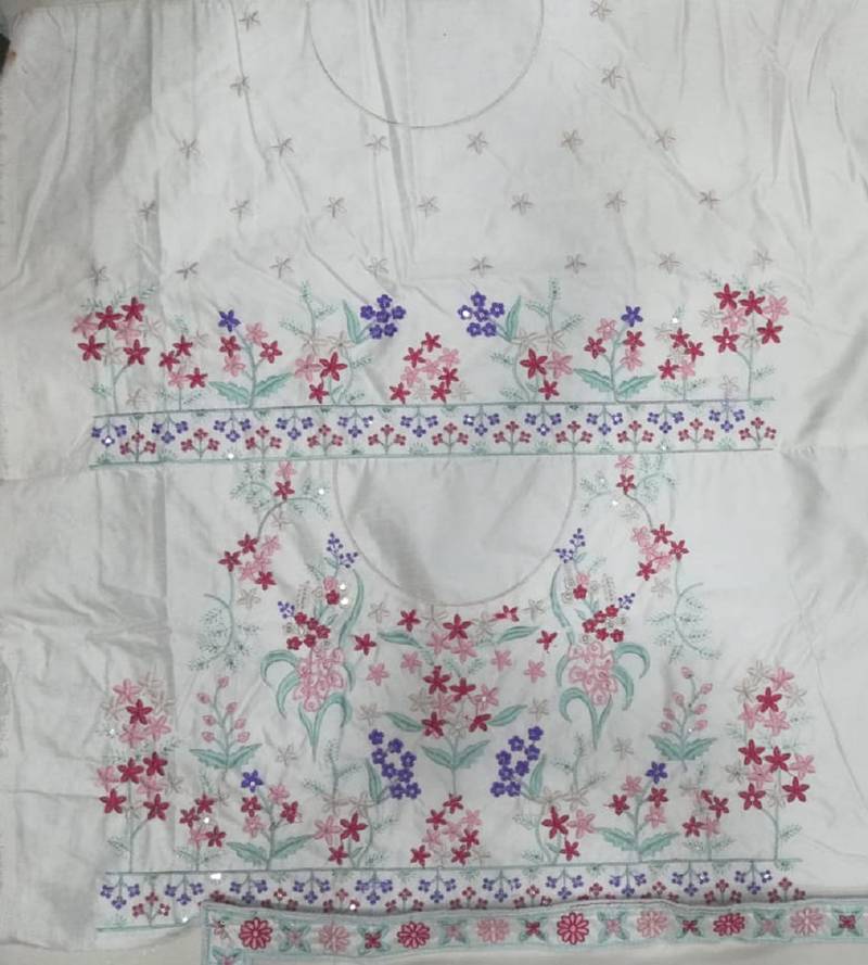 Cream Georgette Thread Embroidered Sleeveless Lehenga Choli With Net Dupatta