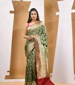 Dark green silk banarasi saree with zari woven designs