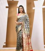 Blue silk banarasi saree with ethnic motifs and woven designs