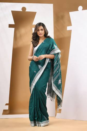 Teal green cotton handwoven soft saree with texture motifs
