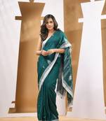 Teal green cotton handwoven soft saree with texture motifs