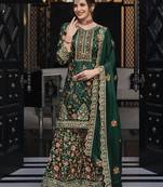Dark green color premium silk embroidered palazzo suit