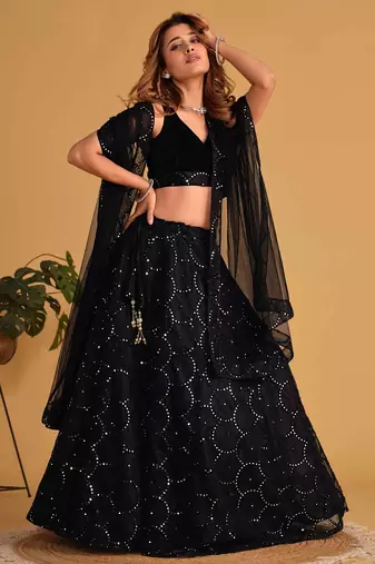 Mesmerizing Black Mirror Work Organza Reception Wear Lehenga Choli