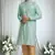 Green silk blend bud motif pattern kurta set for men