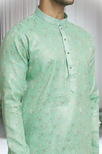 Green silk blend plain floral pattern kurta and churidar set for men