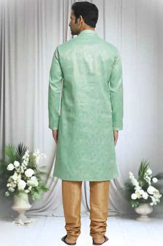 Green silk blend plain floral pattern kurta and churidar set for men