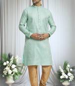 Green silk blend plain geometric pattern kurta and solid churidar set for men