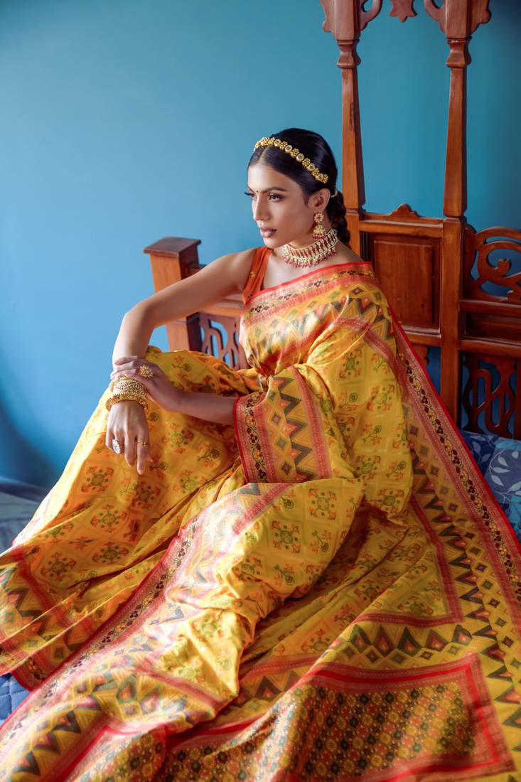 Patola Types Yellow banarasi soft silk patola saree with patola type weaving border ...