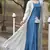 Blue colour ethnic looking gown with shrug