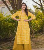 Cassic looking top with palazzo in girlish yellow colour for festive looks
