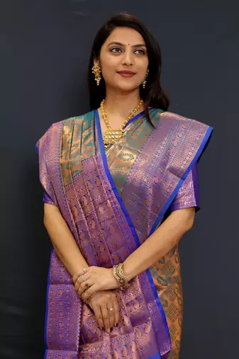 Dark green jaccaurd work kanjivaram silk saree with blouse