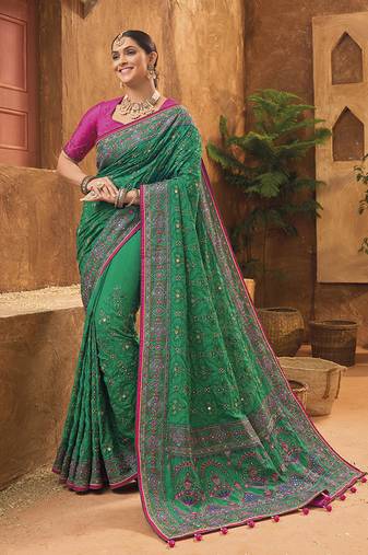 Green colour Banarasi silk blend kachhi work saree with blouse