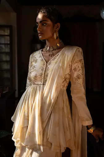 Varra Ivory Peplum Saree Set