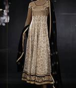 Off-white net semi stitched bridal anarkali suit