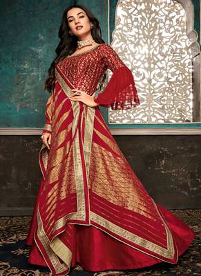 Red silk semi stitched wedding three piece gown 1