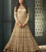 Beige net semi stitched wedding anarkali suit