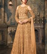 Beige net semi stitched wedding three piece gown