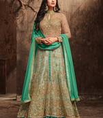 Beige net semi stitched wedding skirt kameez