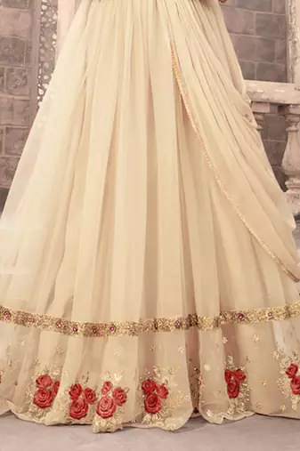 Cream net semi stitched wedding gown anarkali