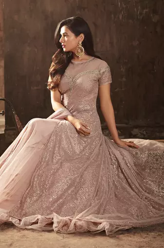 Peach net semi stitched wedding gown with skirt