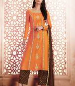 Orange silk semi stitched party pant style suit