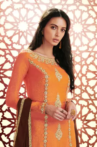 Orange silk semi stitched party pant style suit