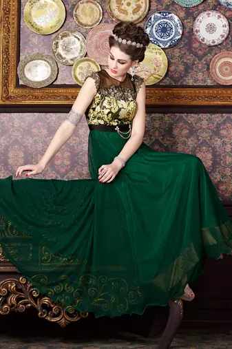 Green net semi stitched party three piece gown