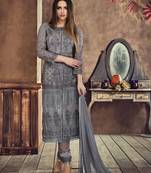 Grey net semi stitched wedding pant style suit