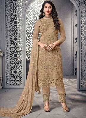 Beige net semi stitched wedding pant suit 1